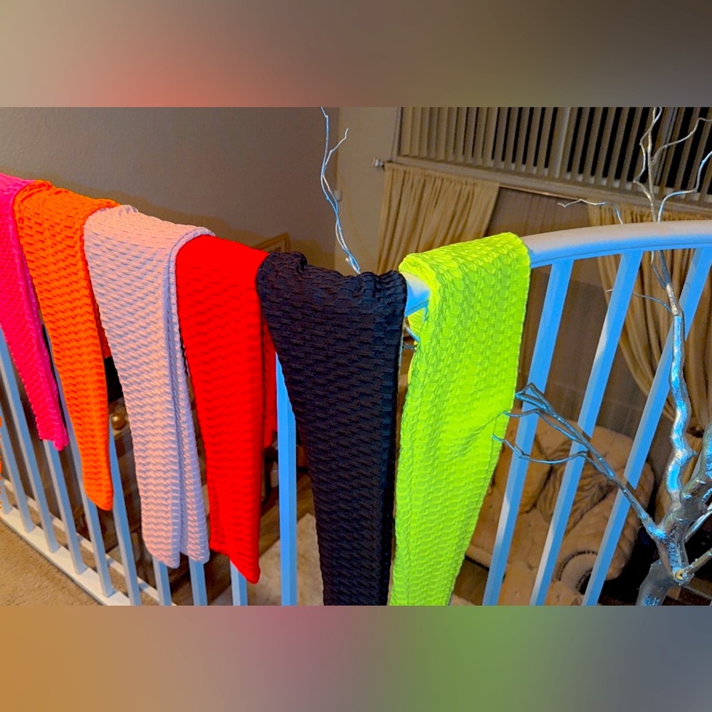 Quantity 3 Small leggings colors are Red, Black and Hot pink